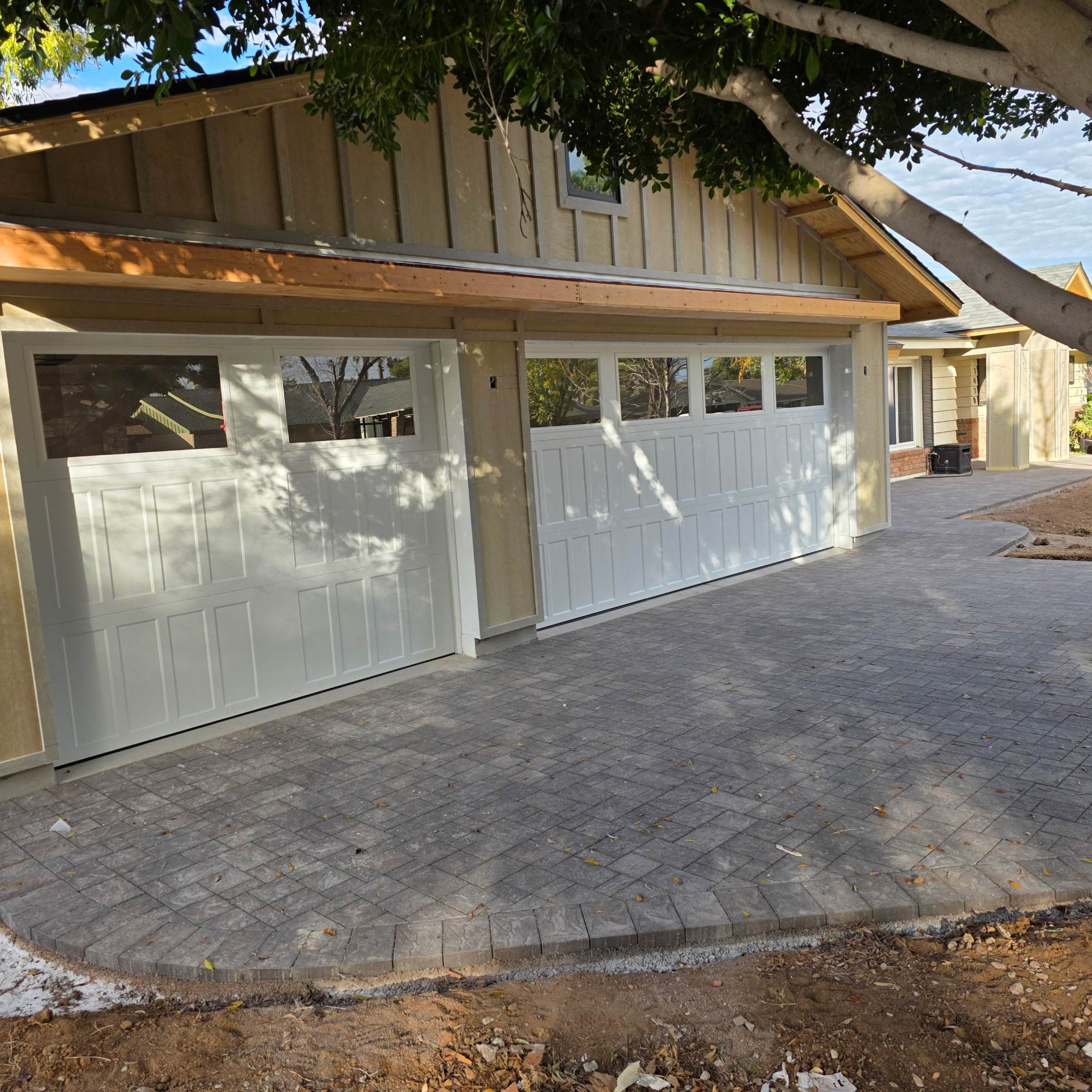 Close-up view of modern garage doors and driveway